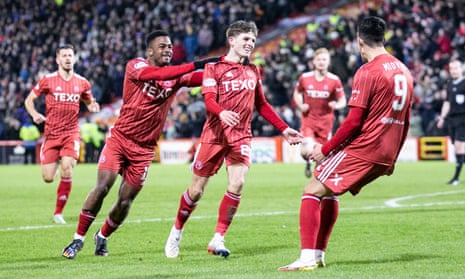 Leighton Clarkson (20) of Aberdeen scores a goal 2-1 and celebrates.