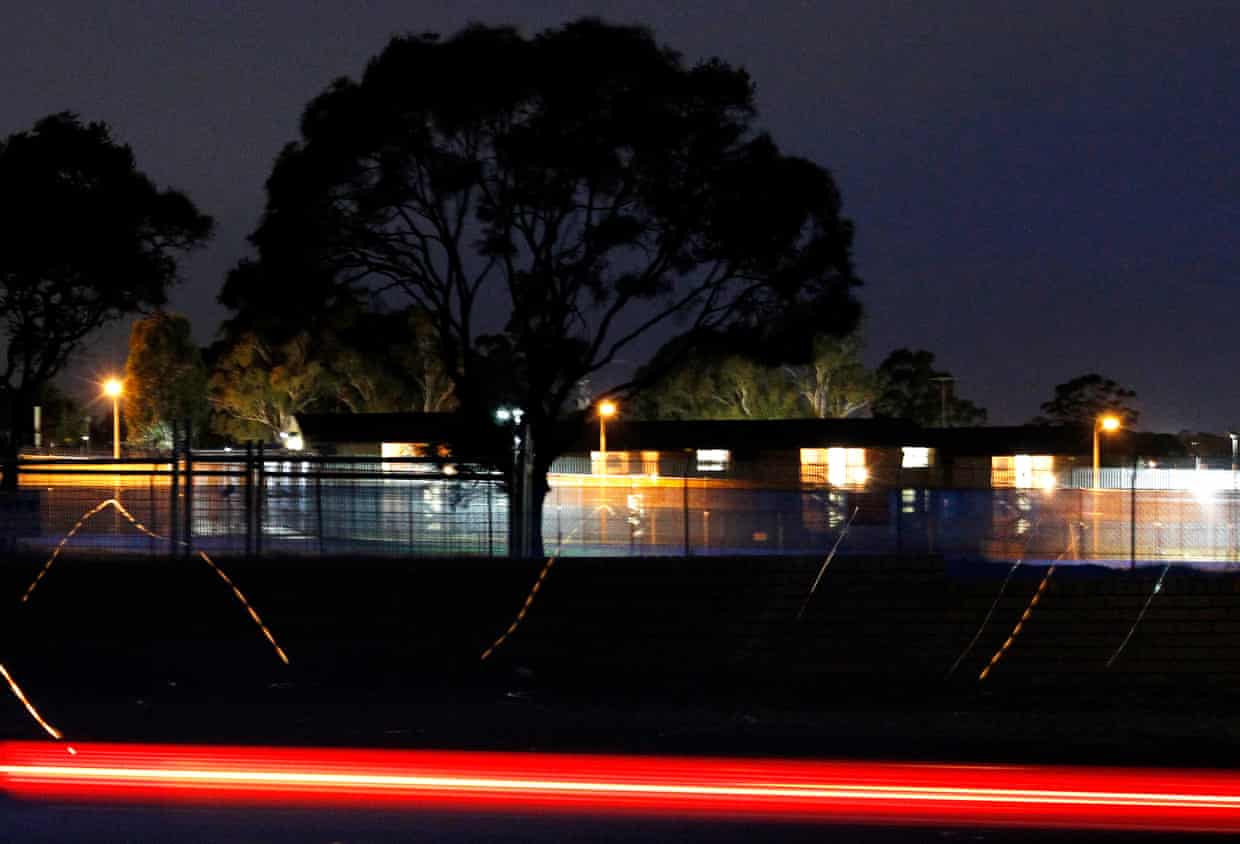 A car drives past the Villawood detention centre in Sydney