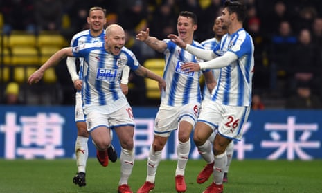 Aaron Mooy celebrates scoring Huddersfield’s second goal against Watford.