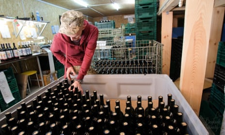 A man sorts bottles at Ukraine’s Beykush winery