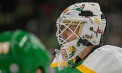 Minnesota Wild goalie Marc-Andre Fleury (29) wears his Native American Heritage mask in warmups before a game against the Colorado Avalanche at Xcel Energy Center on Friday night.
