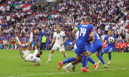 Jude Bellingham scores an overhead bicycle kick during the Euro 2024 round of 16 match between England and Slovakia in Gelsenkirchen, Germany
