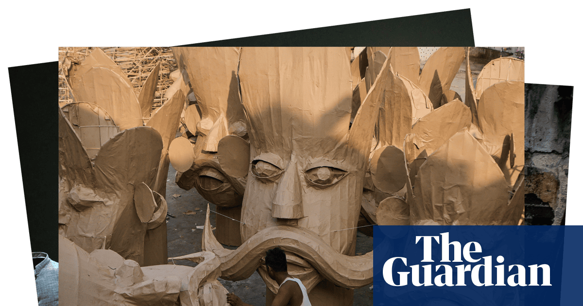 Typhoon Ragasa, a giant sinkhole and an Armani exhibition: photos of the day Wednesday