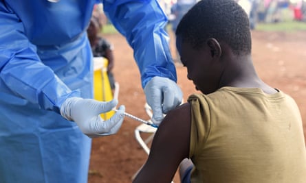 A boy receives the Ebola vaccine in North Kivu.