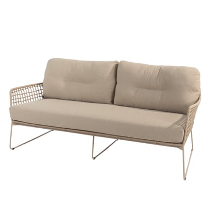 A woven frame two-seater sofa with light grey cushions.