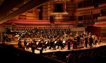 The City of Birmingham Symphony Orchestra on stage in a large auditorium