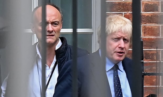 Dominic Cummings leaves Downing Street in London with Boris Johnson in September 2019.
