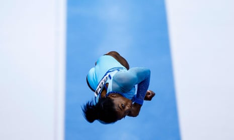 Simone Biles competes in the vault during the women's qualifying session at the gymnastics world championships.
