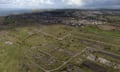 Empty land with the town of Whitehaven in the background