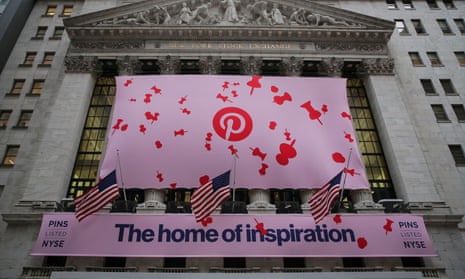 A banner celebrating the IPO of Pinterest hangs at the New York Stock Exchange.
