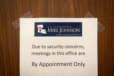 A sign remains on the door of Congressman Mike Johnson’s office in Bossier City, Louisiana on 7 December.