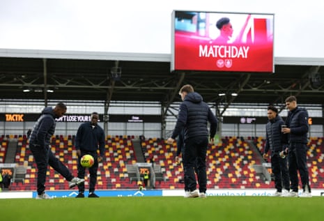 Some Brentford players enjoy a pre-match game of keepy-uppy upon arrival at the Gtech Community Stadium.