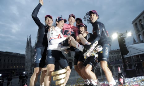 Tao Geoghegan Hart celebrates with his Ineos Grenadiers teammates after winning the Giro d’Italia.