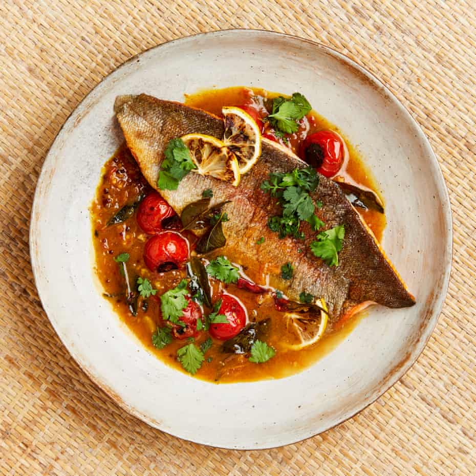 Yotam Ottolenghi’s rainbow trout in spicy tomato and tamarind rasam sauce.