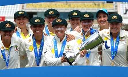 Alyssa Healy holds the Ashes trophy after Australia’s victory over England in June.