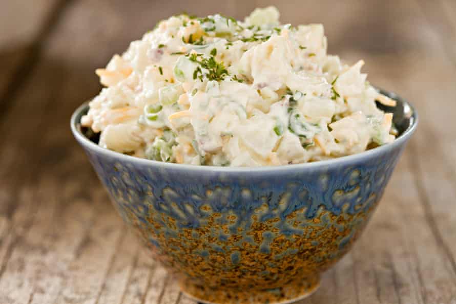 A creamy potato salad with finely chopped celery, apple and chives.