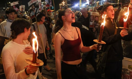 Supporters of Israeli hostages celebrate the ceasefire announcement in Tel Aviv