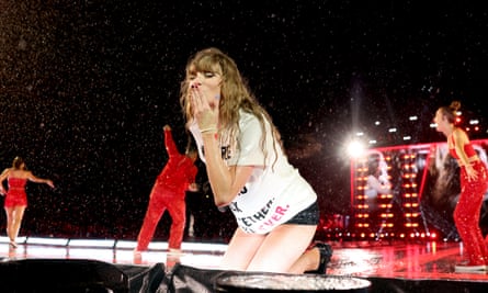 Taylor Swift performing during a rainy show in Nashville, 7 May 2023.