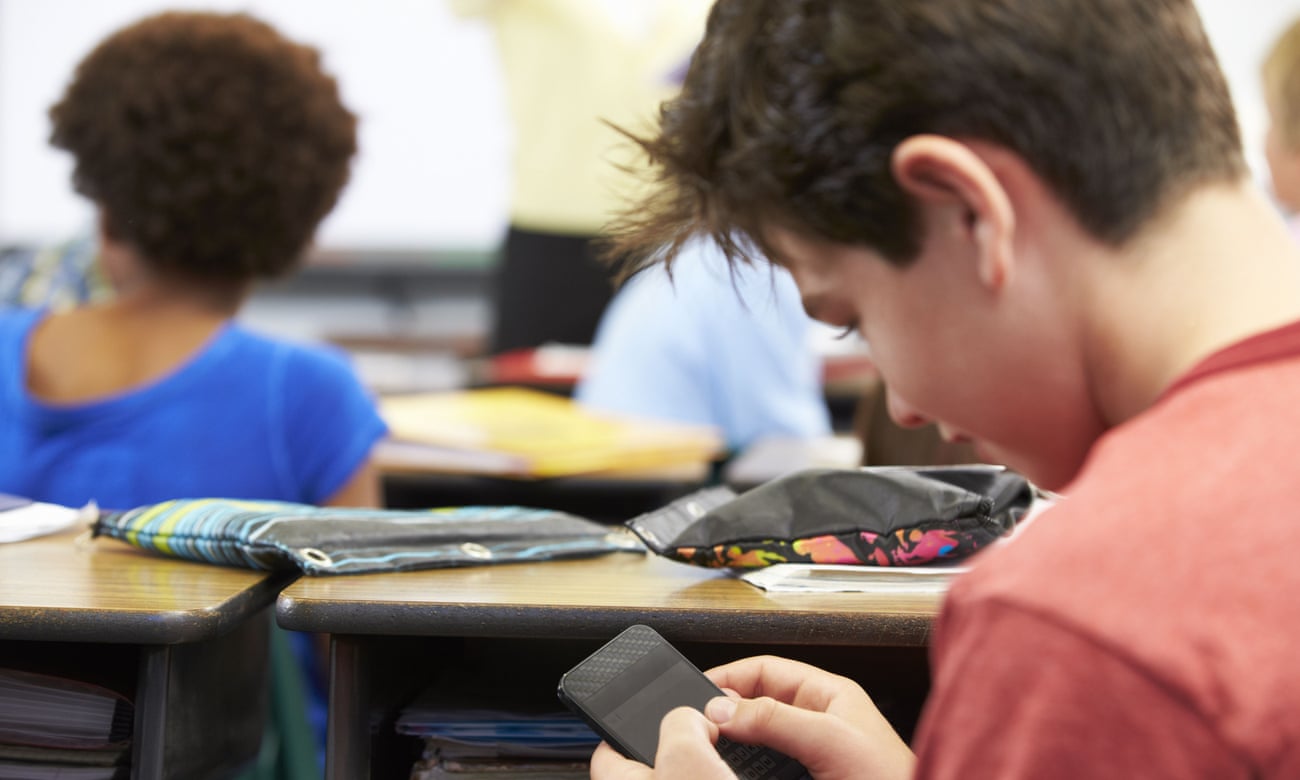 Students using phones in classroom