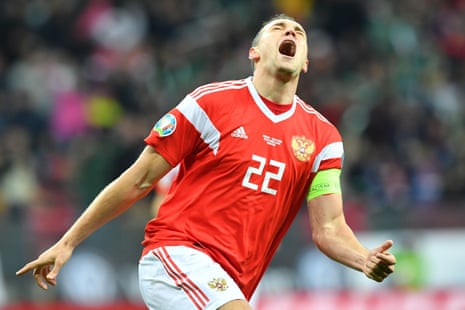 Dzyuba celebrates after scoring the first for Russia against Scotland.