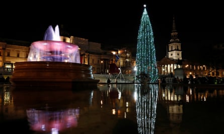 Norwegian spruce Christmas tree lit up in Trafalgar Square.