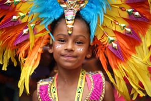 A young performer poses for a photograph