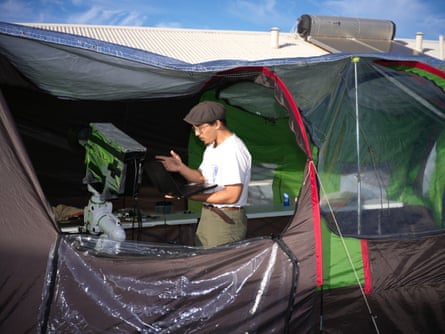 A member of The Solar Wind Sherpas preparing gear.