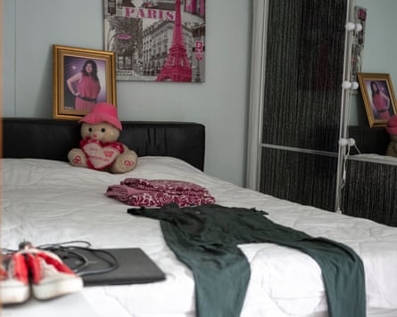 The bedroom of Şebnem Köker in the family home in the western Turkish city of Izmir, with all her belongings left as they were prior to her death, and her nurse scrubs laid out on the bed.