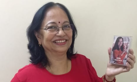 Rupa Biswas holding a cassette of the album she recorded in 1981.