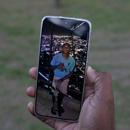 A photograph of Michel Peçanha, 14, on a phone screen