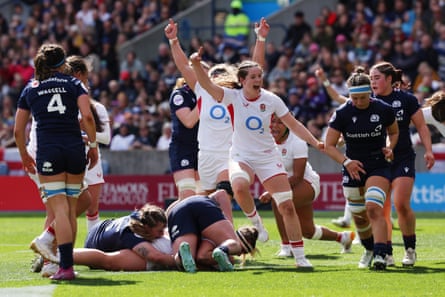 England celebrate as Kelsey Clifford scores their fourth try