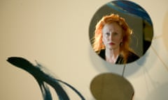 Rebecca Horn, seen in a mirror in one of her own installation pieces in 2005.