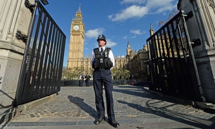 Police officer in front of Houses of Parliament