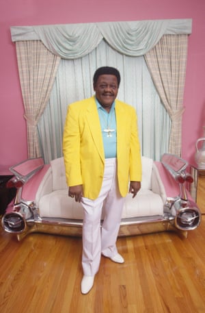 Posing in front of his Cadillac sofa at home in New Orleans’ 9th Ward. His home was destroyed by Hurricane Katrina in 2005