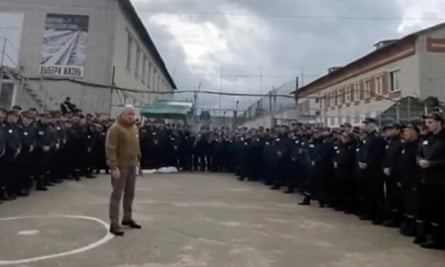 A screengrab shows Yevgeny Prigozhin addressing inmates in a Russian prison offering them freedom for fighting in Ukraine for six months.