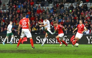 John Egan goes close.