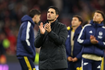 Mikel Arteta applauds the travelling fans after the final whistle
