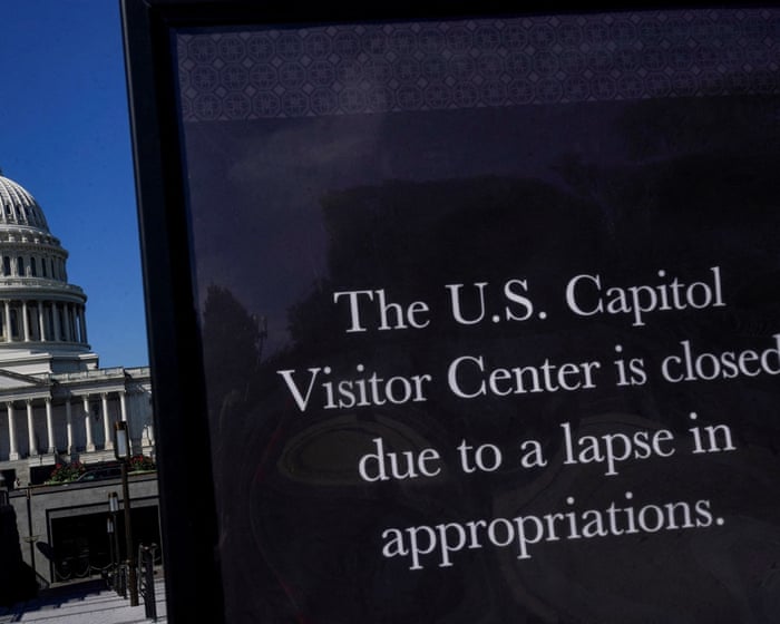 ‘Using us as political pawns’: federal workers reel over threats of firings and withheld back pay