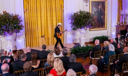 Jill and Joe Biden in the front row watch Brad Paisley perform at the White House in February
