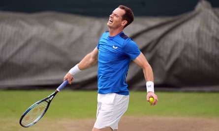 Andy Murray winces during practice at Wimbledon