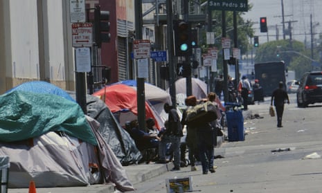 Tents along a street in downtown Los Angeles. The number of homeless people counted across the county has jumped 12% since last year.