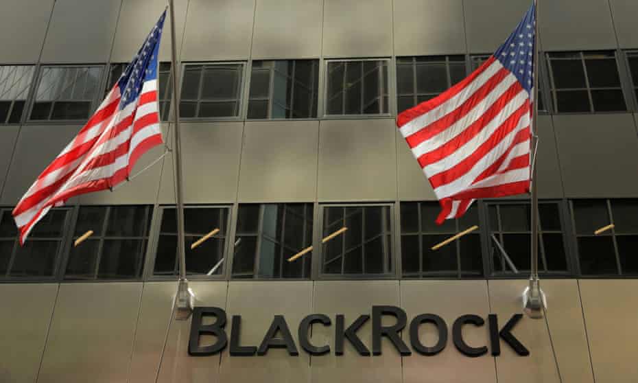 A sign for BlackRock Inc hangs above their building in New York City, US