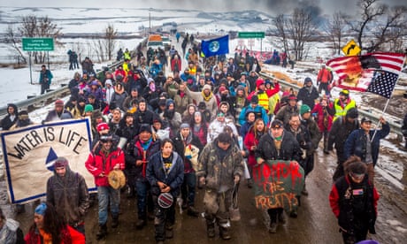 people on snowy road protest