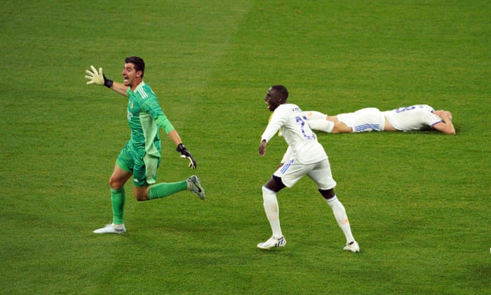 Real Madrid keeper Thibaut Courtois celebrates victory.