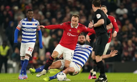 Christian Eriksen is fouled by Reading's Andy Carroll against Reading.