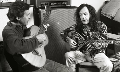 David Lindley, right, playing the bouzouki with Ry Cooder on the guitar, 1998.