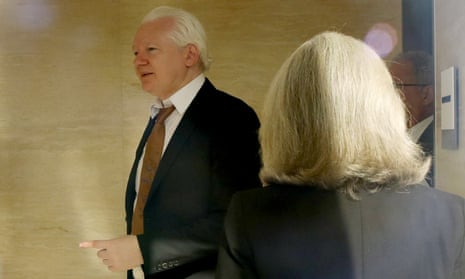 Assange arriving at the Saipan court earlier.