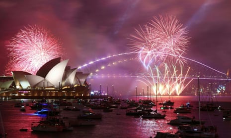 The ‘family fireworks’, which take place three hours before midnight every year ahead of the main show at midnight, fill the sky over the Opera House in Sydney on New Year’s Eve.