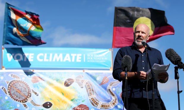 Australian author Richard Flanagan speaks during a Stop Adani rally outside Parliament House on Sunday to mark the last stop on the Tasmania to Canberra via Queensland Stop Adani convoy led by Bob Brown.