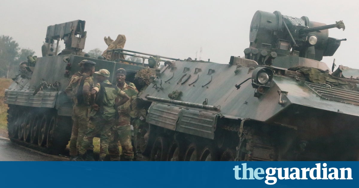 Tensions rise in Zimbabwe as military drives through outskirts of capital